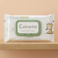 1:1 minimalist product photography of "Calinette - Lingettes Bébé Sensitive" container placed perfectly in the center of a clean, light oak wooden shelf. The soft-focus background is a simple, plain wall in a warm pastel tone. The light is diffused, bright, and clear. Zero distractions, strict central composition. Shot on 70mm lens, f/4.0, ISO 250, highly detailed plastic texture, no CGI. --ar 1:1 (gemini-3-pro-image-preview)
