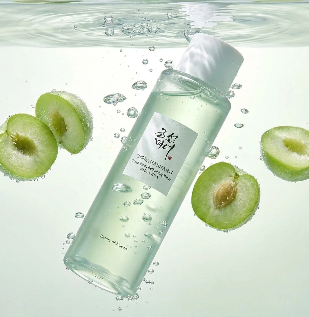 Angle 45°  Beauty of Joseon Green Plum Refreshing Toner appearing suspended inside crystal clear water, floating green plum slices around the bottle, realistic bubbles, premium Korean skincare campaign, photorealistic liquid simulation, luxury beauty advertisement. (gemini-3-pro-image-preview)