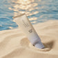 Angle : 45°  Beauty of Joseon Relief Sun SPF50+ placed on smooth beige sand with soft ocean reflections in the background, luxury summer skincare campaign, premium sunscreen photography, realistic natural sunlight, photorealistic beauty advertising. (gemini-3-pro-image-preview)